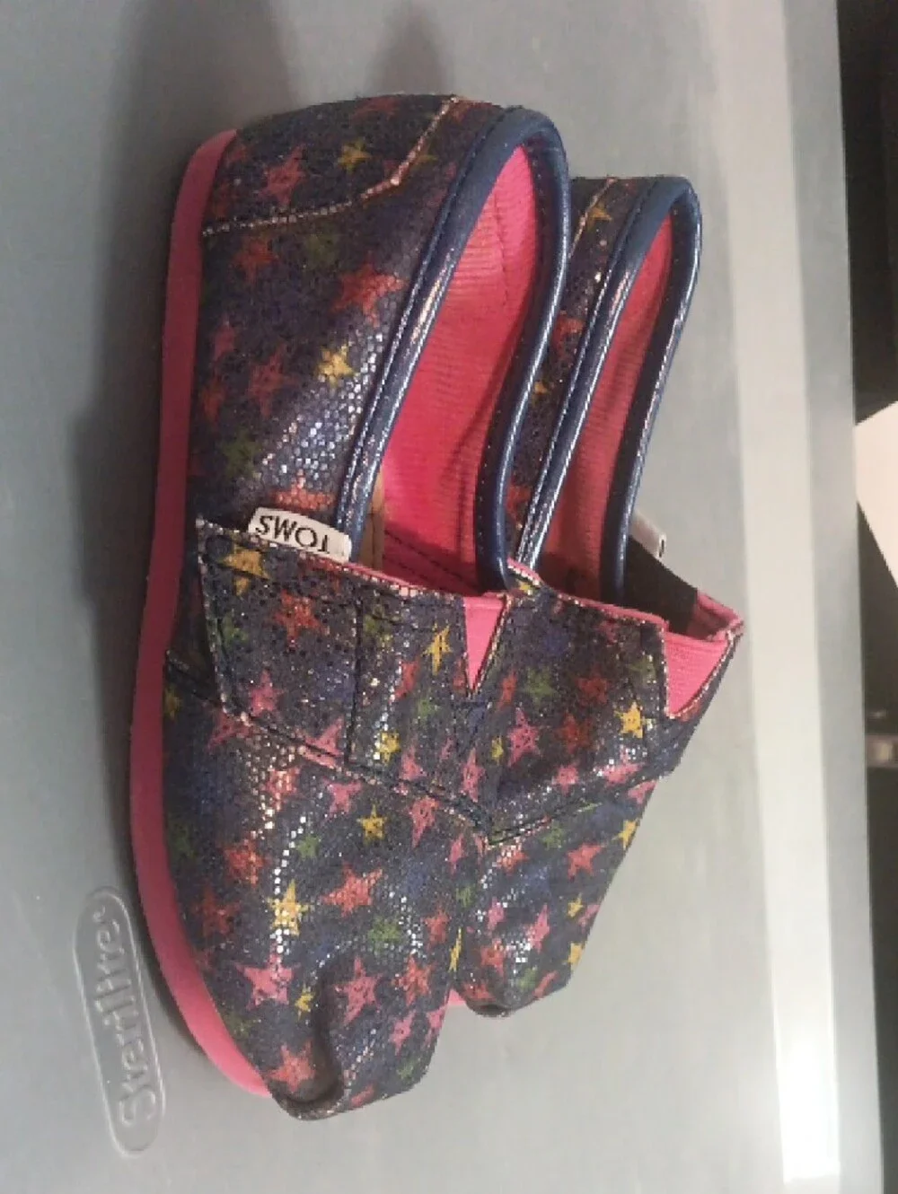 Toms Kids Navy Slip-On Moccasins with Multicolor Star Print and Pink Lining